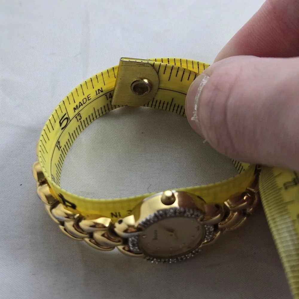 Bulova Women 98R18 Luxury Diamond Bezel Gold Tone Quartz Watch 5.5